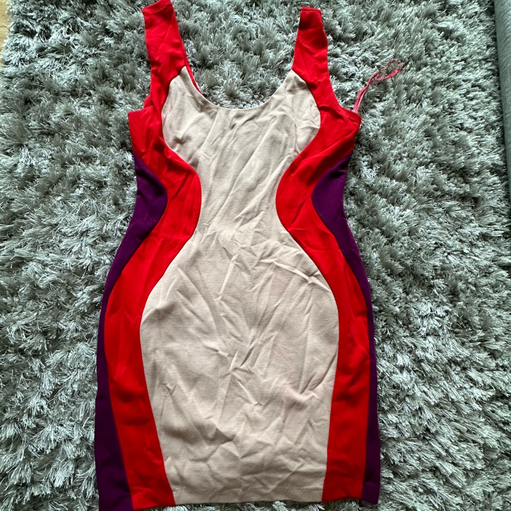 Red, tan and purple Bodycon dress. Size L. Very flattering.